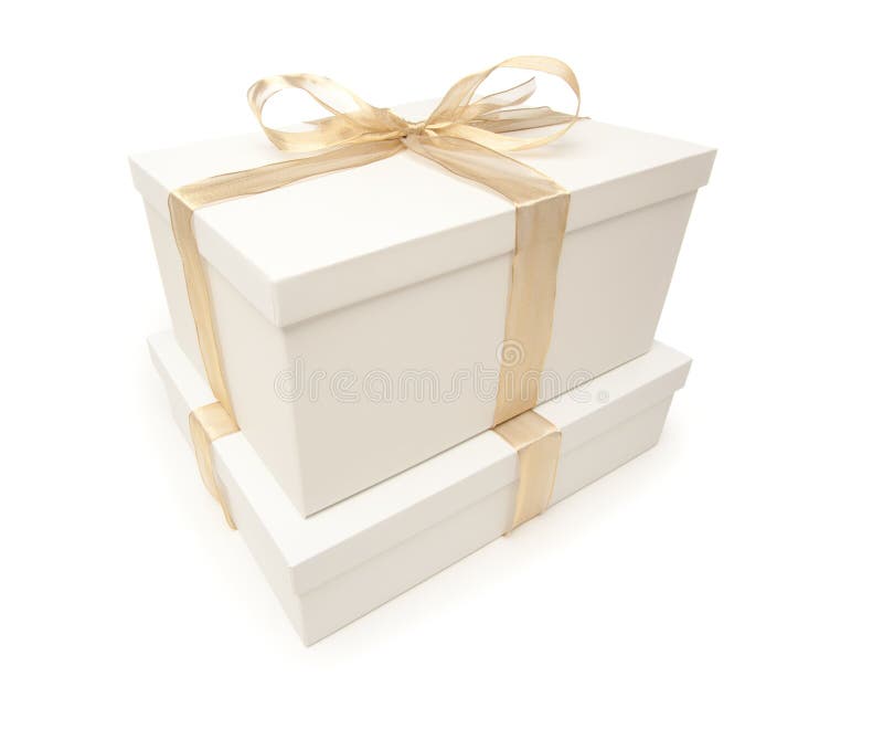 Stacked White Gift Boxes with Gold Ribbon Isolated Stock Photo Image