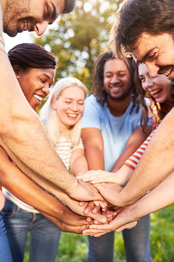Stacking Hands for Friendship and Team Building Stock Photo Image of