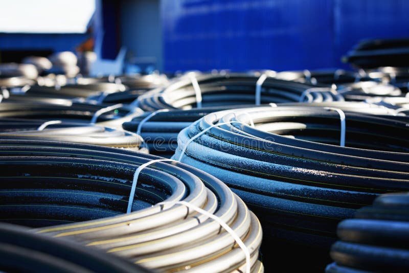 Stacks Of Black Pvc Plastic Pipe Outdoors With Selective Focus Stock