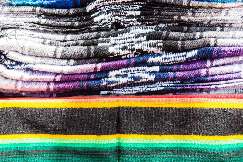 Stacks of colored blankets stock image