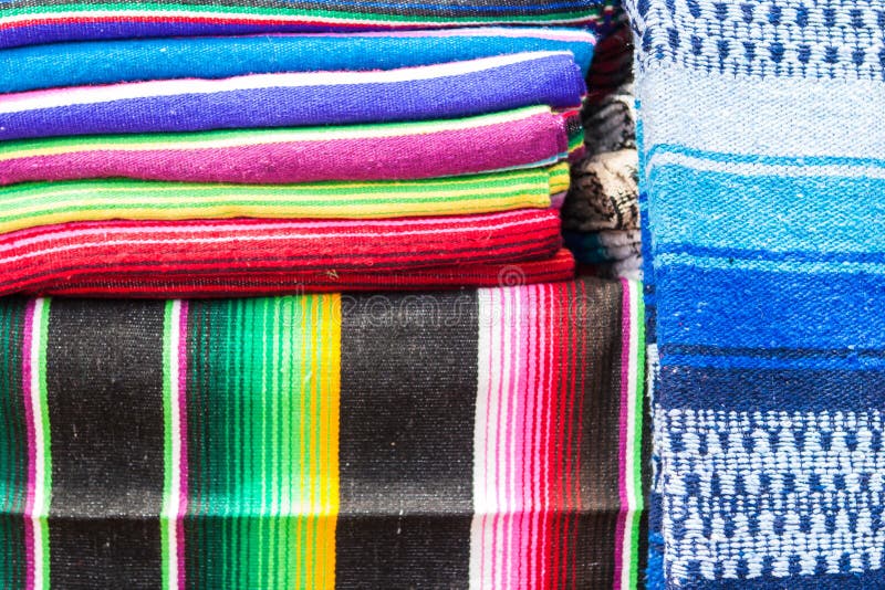 Stacks of colored blankets stock photography