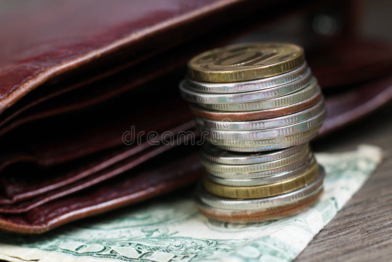 Stacks of silver and golden coins stock photography