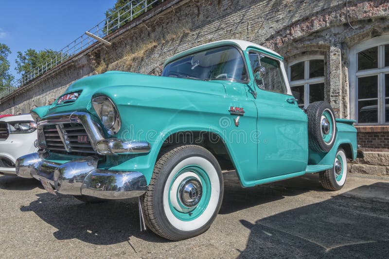 Vintage 1957 GMC 100 pickup truck. Stade, Germany - July 8, 2018: A 1957 vintage GMC 100 pickup truck at 5th Summertime Drive US car meeting stock images Vintage 1957 GMC 100 pickup truck. Stade, Germany - July 8, 2018: A 1957 vintage GMC 100 pickup truck at 5th Summertime Drive US car meeting stock images