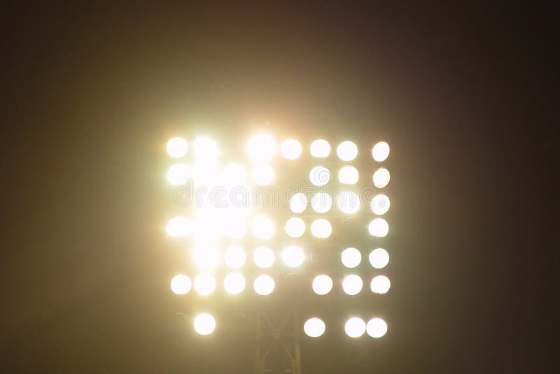 Stadium lights during a football game