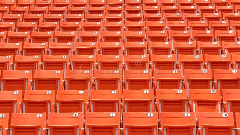 Stadium seat rows in sports arena for football or soccer game, public theatre, concert hall amphitheater with empty red audience