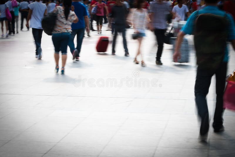 City people walking on piazza in motion blur. City people walking on piazza in motion blur