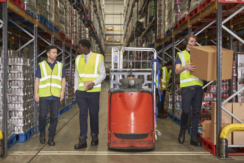 Staff at Work in the Aisle of a Busy Distribution Warehouse Stock Photo Image of length