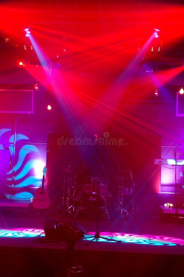 Stage ready for concerts with bright red and blue lights. Stage ready for concerts with bright red and blue lights