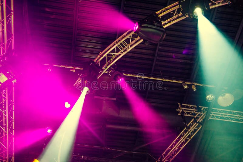 Stage Lights on Concert. Lighting Equipment with Multicolored Beams. Bottom View. Selective