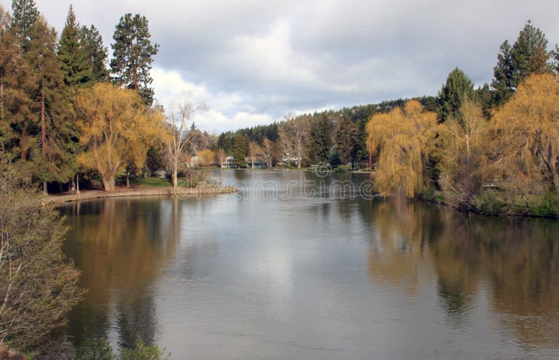 Mirror Pond highlights Drake Park, the most popular park in Bend, Oregon, for special events, concerts, paddleboarding, canoeing, river floating, swimming, bird watching and casual strolls. Mirror Pond highlights Drake Park, the most popular park in Bend, Oregon, for special events, concerts, paddleboarding, canoeing, river floating, swimming, bird watching and casual strolls.