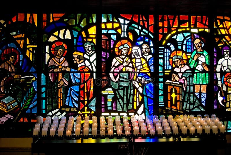 Stained Glass and Candles stock image. Image of catholic 13151555