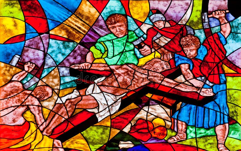 Stained glass showing Jesus' crucifixion.