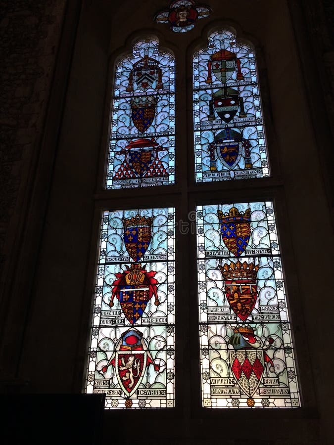 Stained glass window, with family crests, at a slight angle