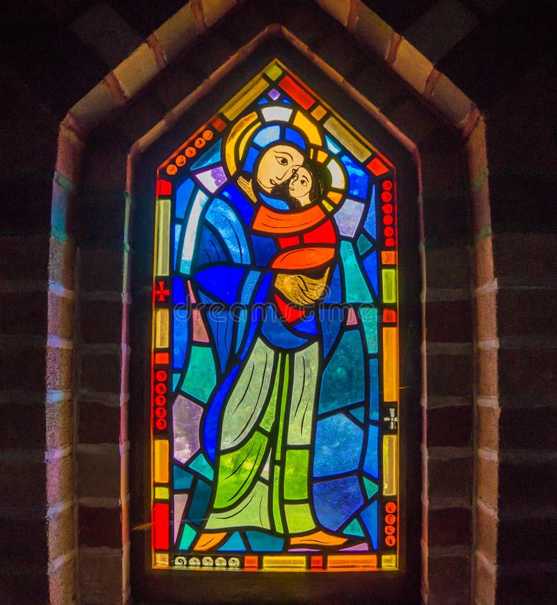 Stained glass window of Mary, mother and child