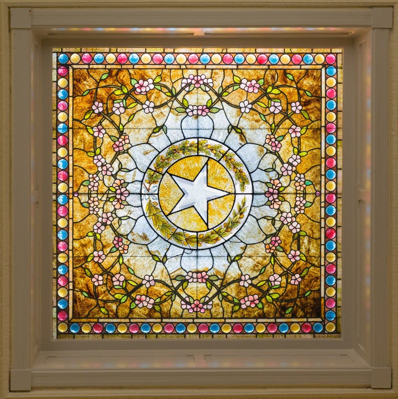 Stained glass window with the star of Texas in Austin
