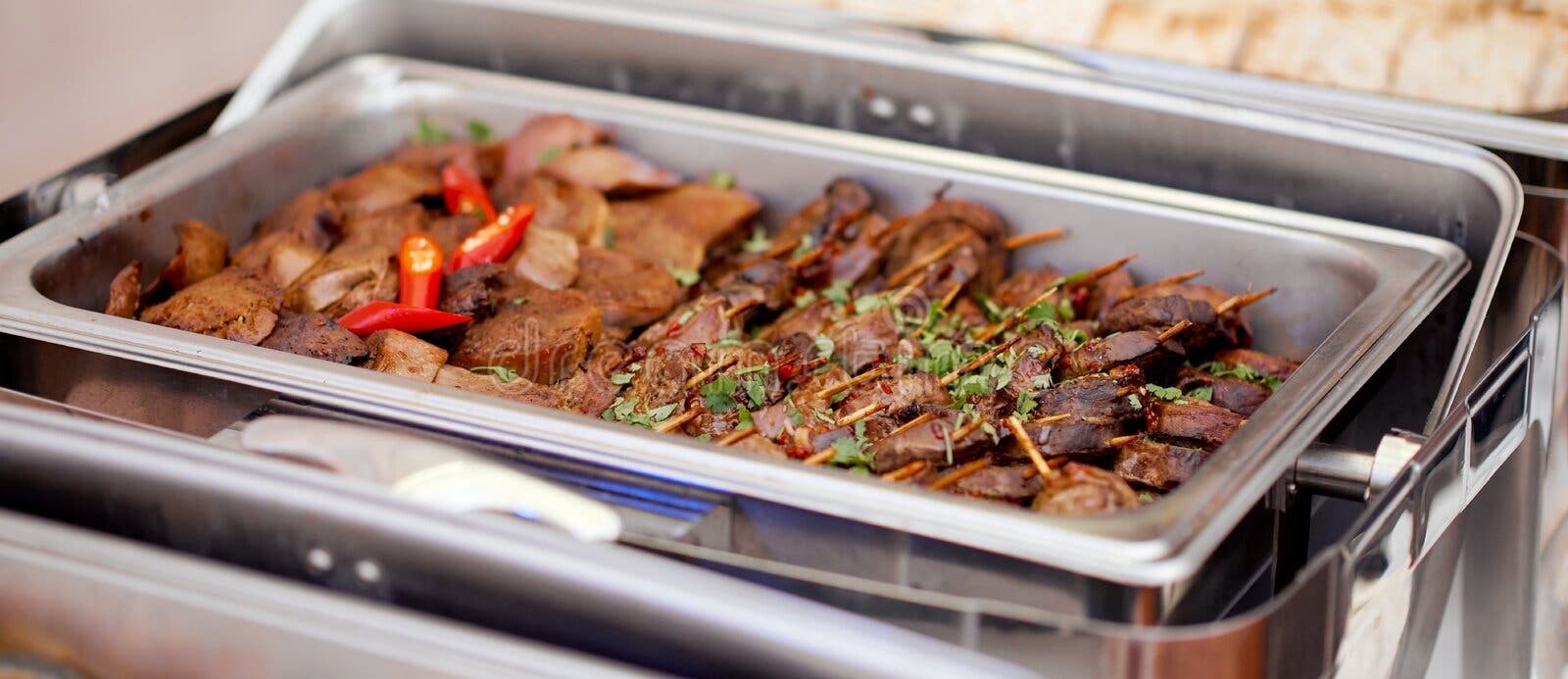 https://thumbs.dreamstime.com/b/stainless-hotel-pans-food-warmers-various-meals-self-service-buffet-table-celebration-party-wedding-grilled-beef-steaks-189972850.jpg?w=1600