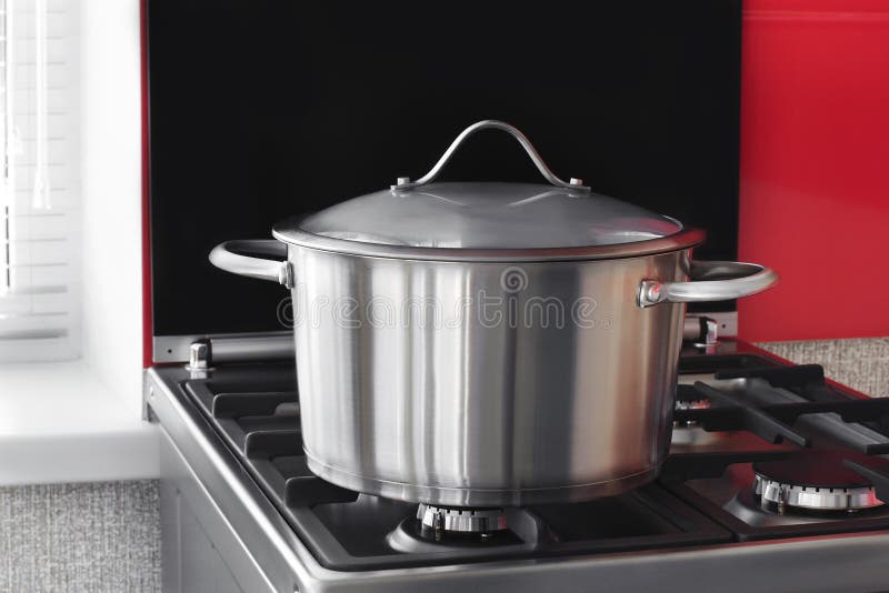 Stainless Saucepan on a Gas Stove Stock Image Image of steel, black