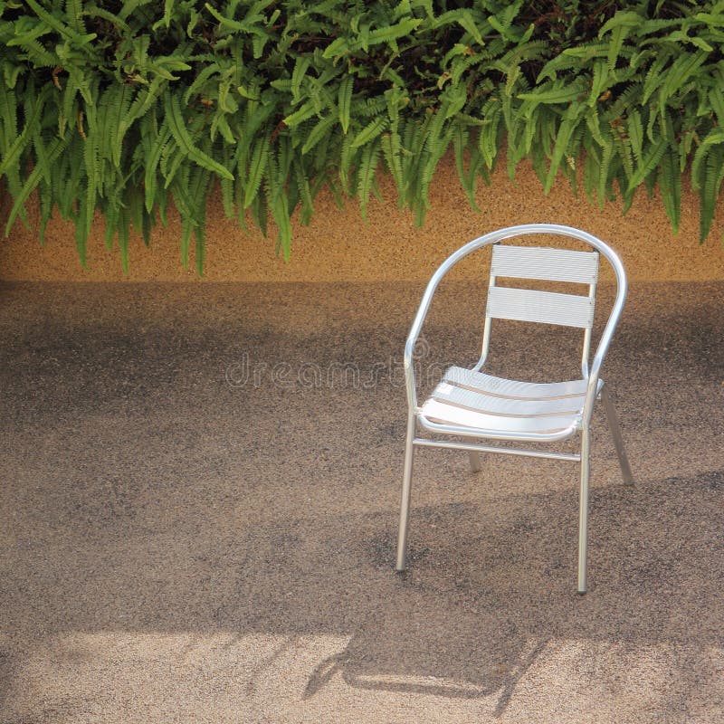 Stainless steel chair in a garden