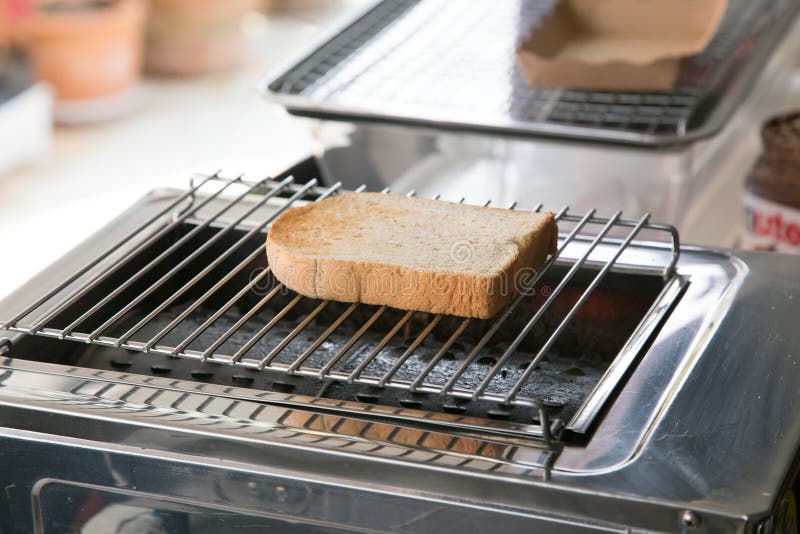 Toasted bread on the grill stock photo. Image of dinner 30206258