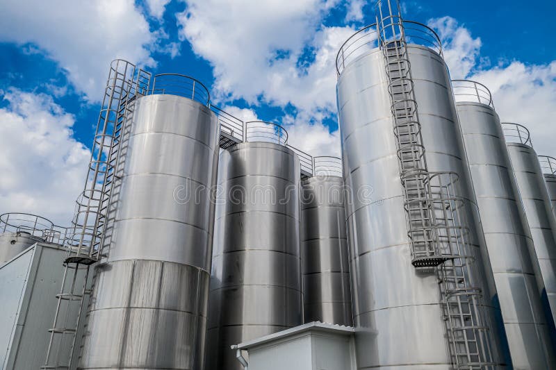 Stainless steel tanks at a food processing plant top view royalty free stock photography