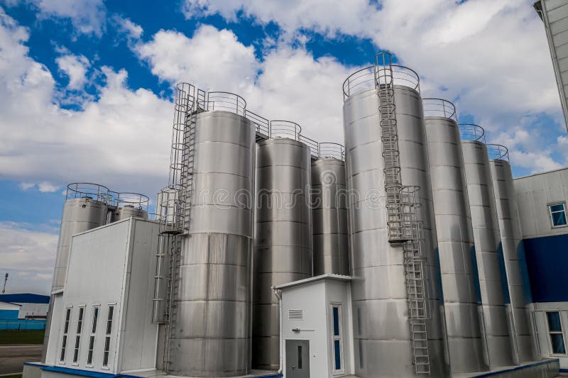 Stainless steel tanks at a food processing plant top view stock photos