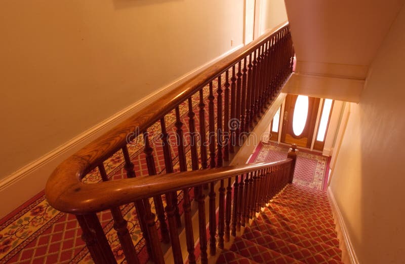 Staircase Covered in Carpets in a Building Under the Lights Stock Photo