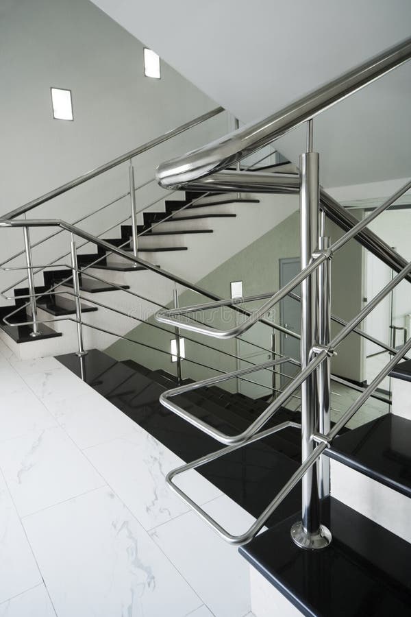 Staircase with a steel handrail