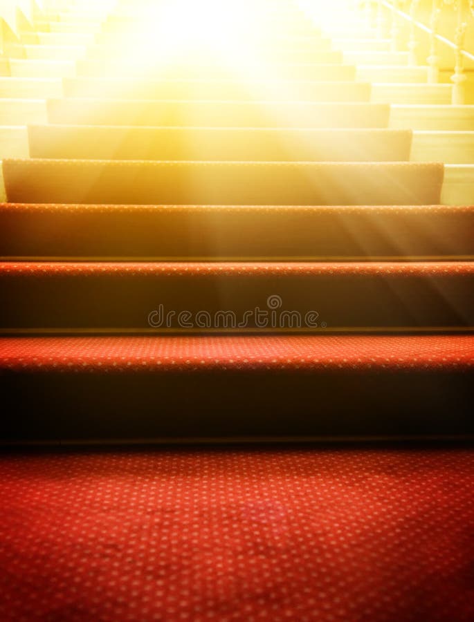 Stairs covered with red carpet stock photos