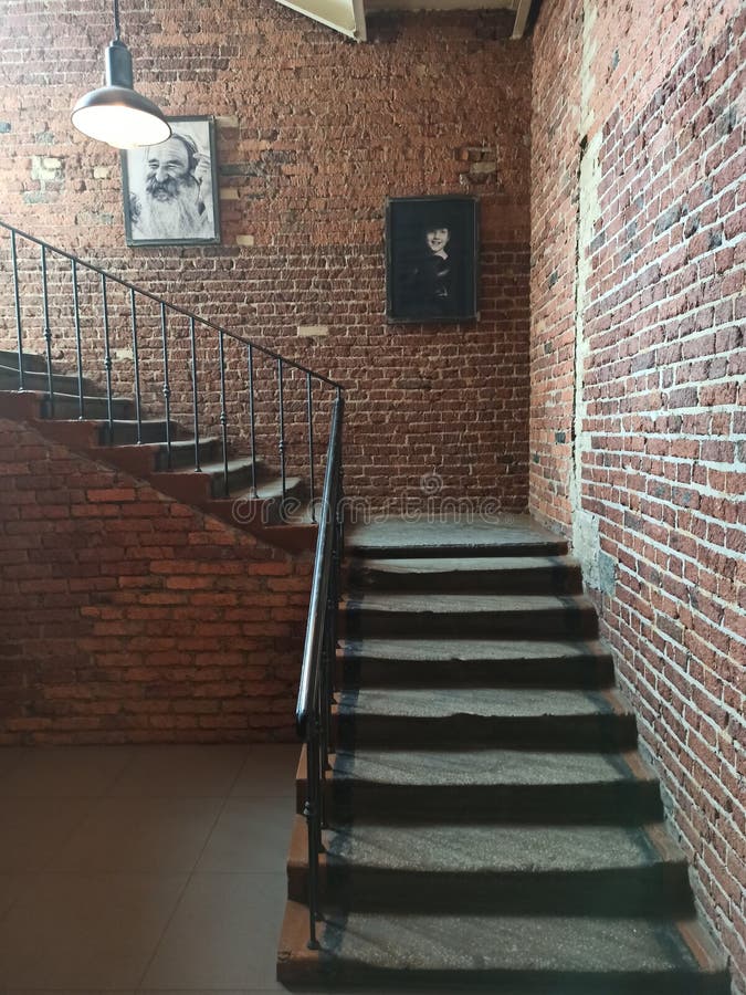 Stairs loft and brick wall editorial photography. Image of ceiling 215417942