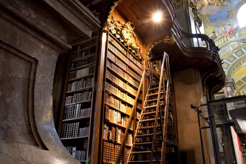 Stairs near the tall bookcase inside the library royalty free stock image Stairs near the tall bookcase inside the library royalty free stock image