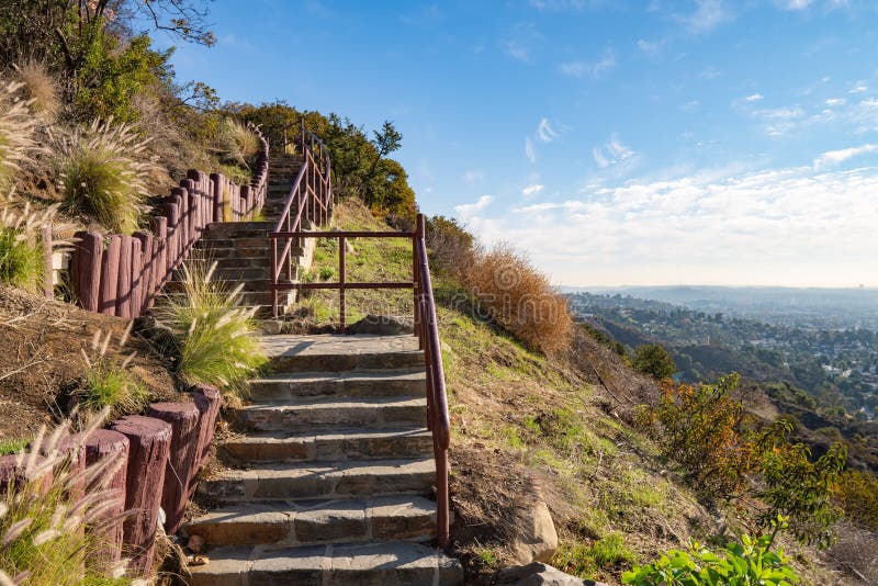 Stairs on observation deck on Hollywood Hills. Warm sunny day. Beautiful clouds in blue sky