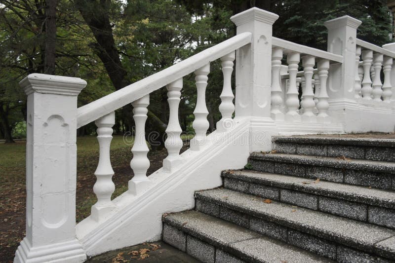 Stairs with white railing stock image. Image of railing 79843575
