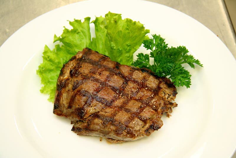 Roasted Pork Stake At The White Plate Stock Photo - Image of stake