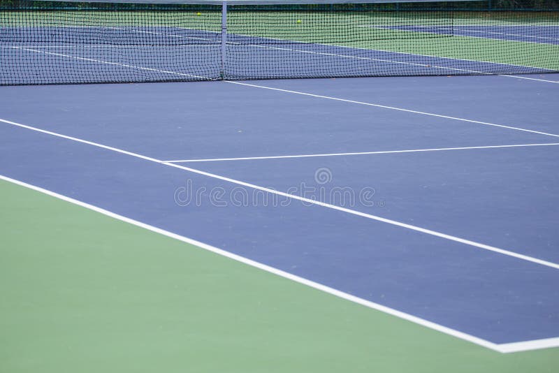 Steel mesh fence of the tennis courts background. Steel mesh fence of the tennis courts background