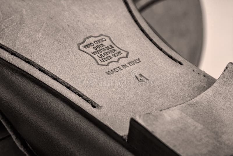 Embossed International Stamp Genuine Leather on the Sole of Shoe Stock Photo - Image of texture