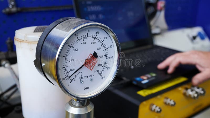 At the stand, the process of checking the operability and wear, the operational properties of the nozzle of a diesel internal royalty free stock photo