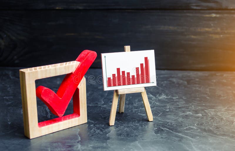 Stand with a red graph and a check mark. Voting, high rating. The concept of high voter turnout, the growth of statistical indicators. Raising the popularity of politicians parties selective focus