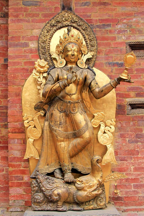 Standbeeld van de riviergodin Ganga in Patan, Nepal royalty-vrije stock foto Standbeeld van de riviergodin Ganga in Patan, Nepal royalty-vrije stock foto
