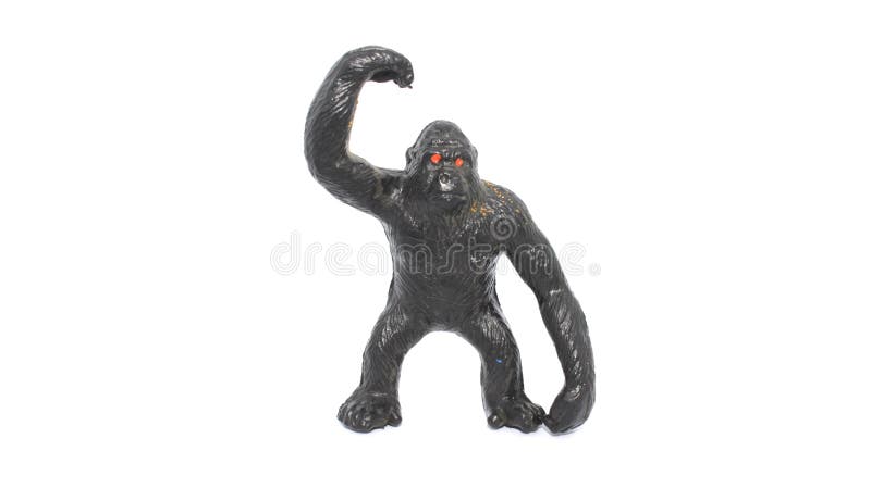 Standing black gorilla figurine in white background