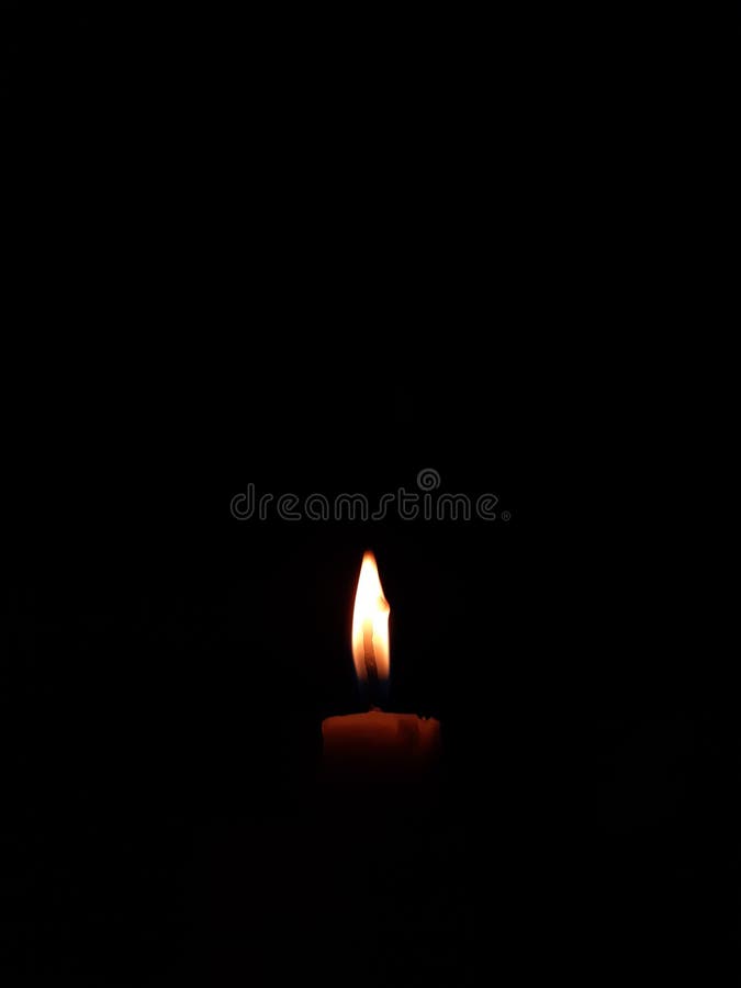 Standing and Burning Candle Stock Photo Image of text, flame 263529040