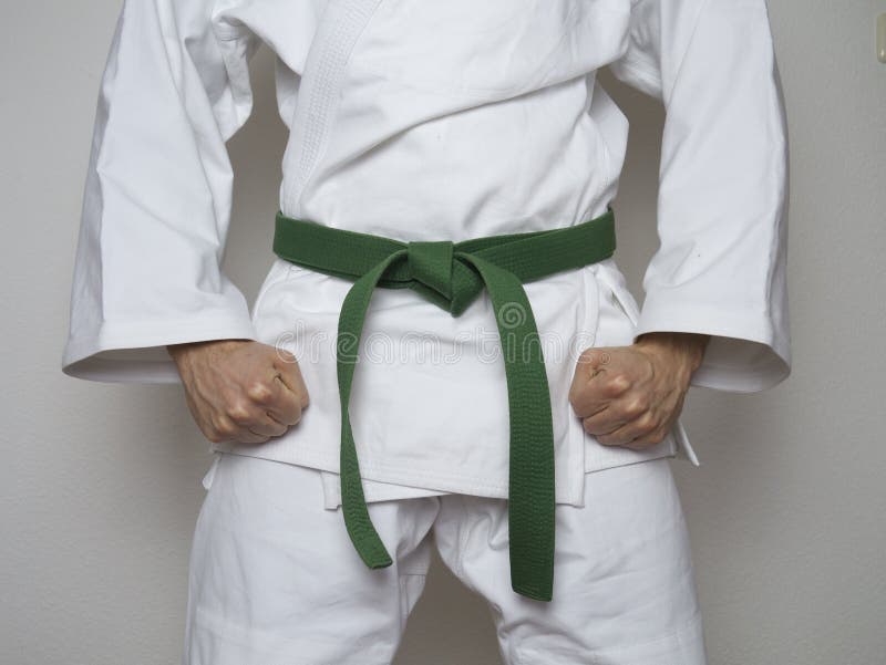 Standing fighter green belt centered martial arts