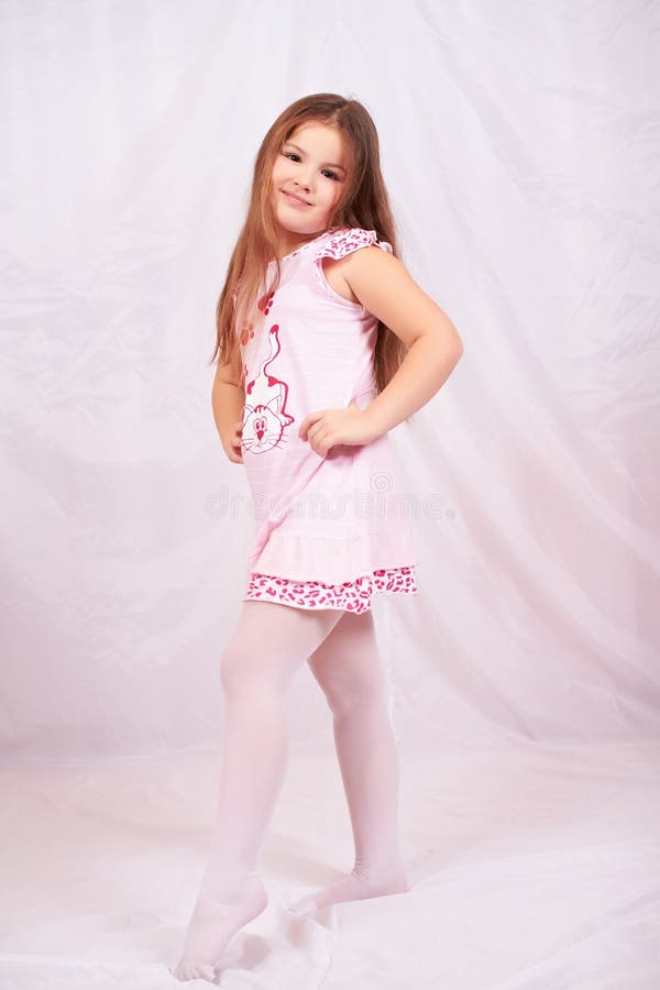 Standing a little girl. stock photo. Image of arms, small - 18398842