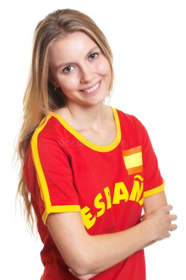 Beautiful woman with long blond hair in a spanish football jersey laughing at camera on a white background. Beautiful woman with long blond hair in a spanish football jersey laughing at camera on a white background