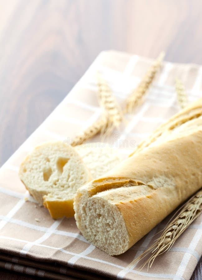 Fresh baguette bread sliced closeup. Fresh baguette bread sliced closeup