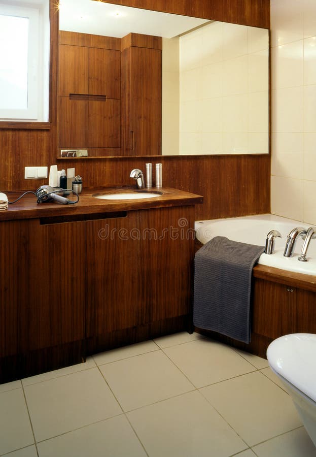 Big bathroom with wooden wall. Big bathroom with wooden wall