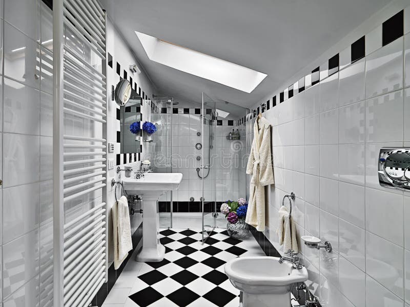 Modern bathroom in black and white with glass shower cubicle on garrett. Modern bathroom in black and white with glass shower cubicle on garrett