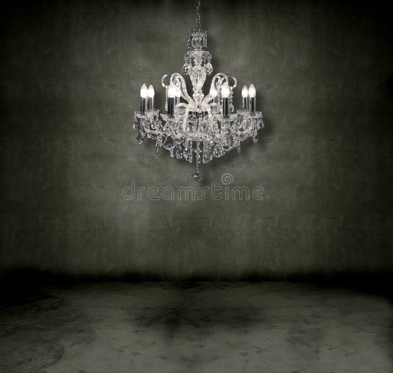 Crystal chandelier hanging in a dark grungy room. Crystal chandelier hanging in a dark grungy room