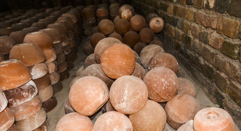 Pile of cup & ball salt lamps - Natural lamps are famous all over the world for their unique beautiful light. These salt lamps emit colorful apricot, yellow & orange light. These are carefully crafted from rock salt taken from mines in Salt Range Mountain located near Quaidabad, Khushab, Pakistan. Natural salt lamps are used to decorate drawing rooms, offices & bedrooms. It ionizes and purifies the air which can be very healthful for asthma & patients with joint pains. Today, the health benefits of ionizers are well recognized; whilst most ionizers in the market are manmade, the crystal salt lamps are Mother Nature`s beautiful alternative. Pile of cup & ball salt lamps - Natural lamps are famous all over the world for their unique beautiful light. These salt lamps emit colorful apricot, yellow & orange light. These are carefully crafted from rock salt taken from mines in Salt Range Mountain located near Quaidabad, Khushab, Pakistan. Natural salt lamps are used to decorate drawing rooms, offices & bedrooms. It ionizes and purifies the air which can be very healthful for asthma & patients with joint pains. Today, the health benefits of ionizers are well recognized; whilst most ionizers in the market are manmade, the crystal salt lamps are Mother Nature`s beautiful alternative.