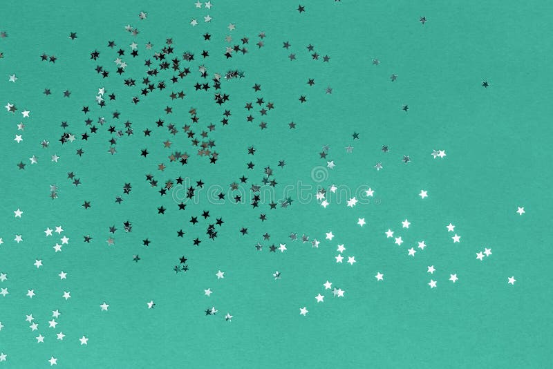 Star Shaped Glitter Confetti on Green Background Stock Image Image of