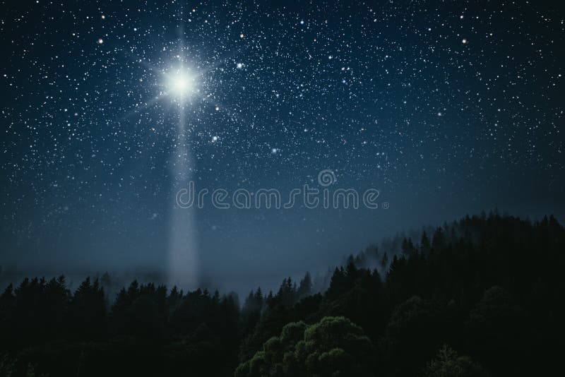 A The star shines over the manger of christmas of Jesus Christ